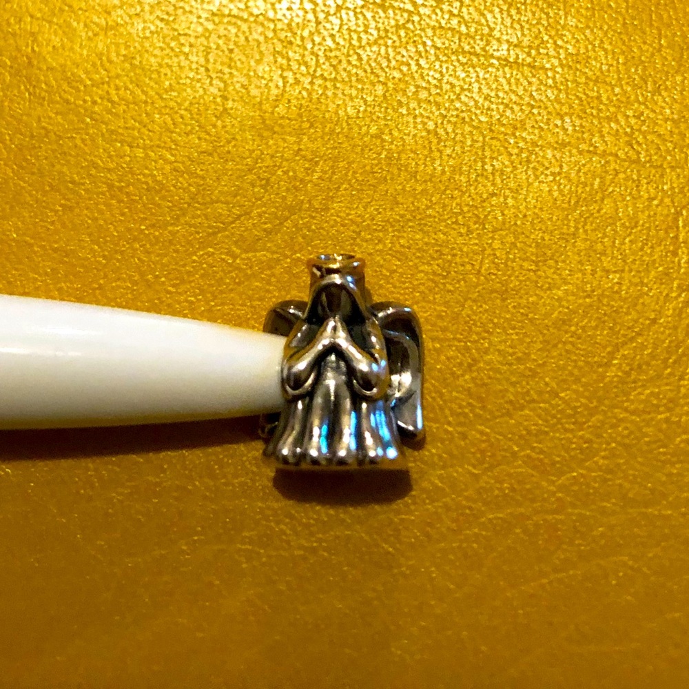 Pandora Angel of love charm with a gold halo